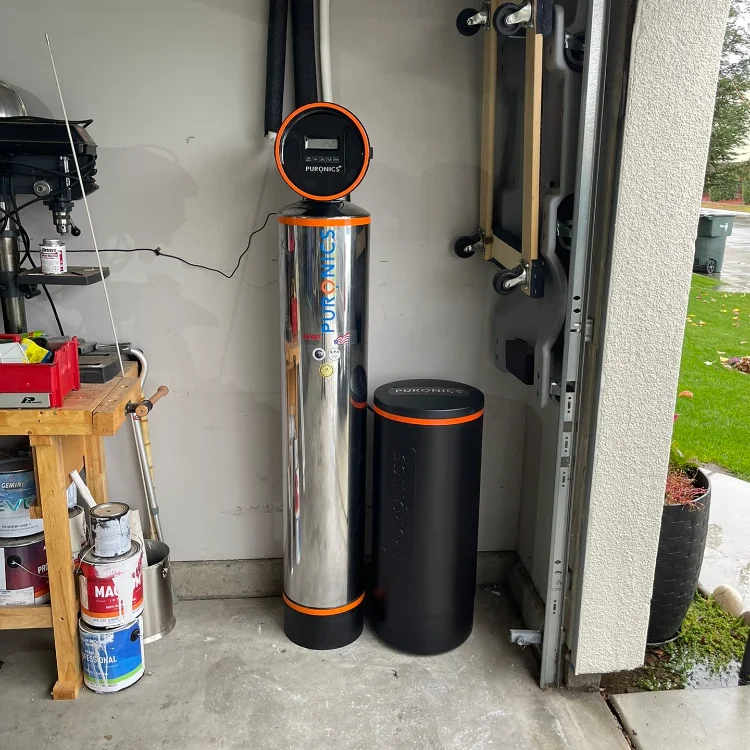 Whole home water filtration system installed in garage